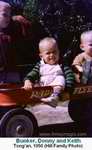 Bunker, Donny and Keith Hill with red wagon, 1950