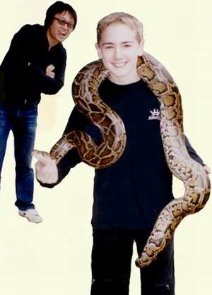 Matthew with a python at the Xiamen Haicang Safair Park (I keep telling Matthew not to play with his food!)