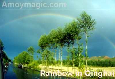 This beautiful rainbow was just east of Xining; I shot the photo, and 5 minutes later our tire was shredded by nails in the road