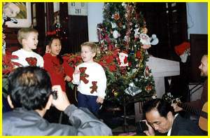 Boys and Clara singing in Church for Christmas, about 1992