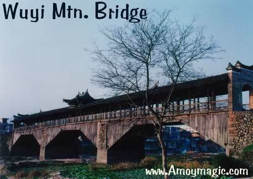 Grand old Chinese covered wooden bridge in Wuyi Mountain 