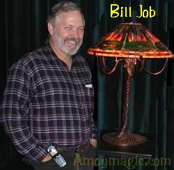 Bill Job in front of stained glass lamp