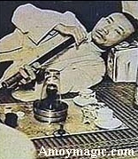 opium addict smoking pipe photograph