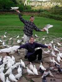 Shannon and Matthew pose with birds