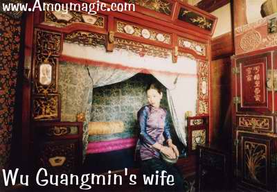 Wuyi Guangmin's wife posing as traditional wife--though this beautiful lady is as modern as anyone you could meet!   Wuyi Mountain, Fujian Province   